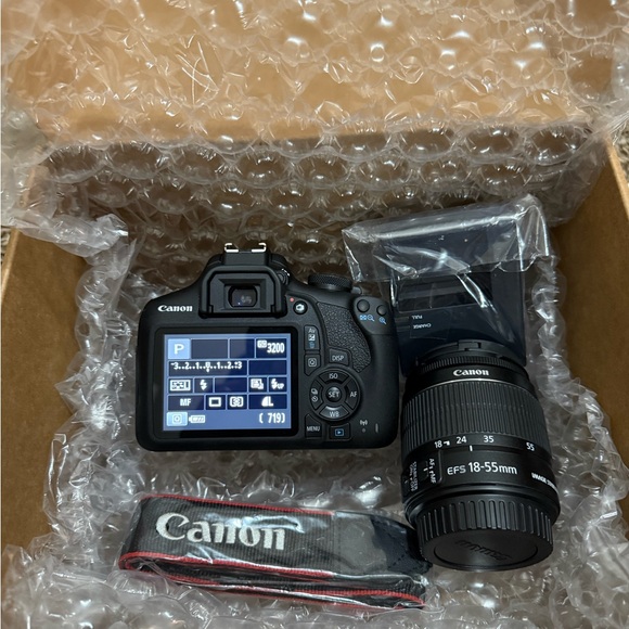 Canon Black DSLR with 18-55mm Lens